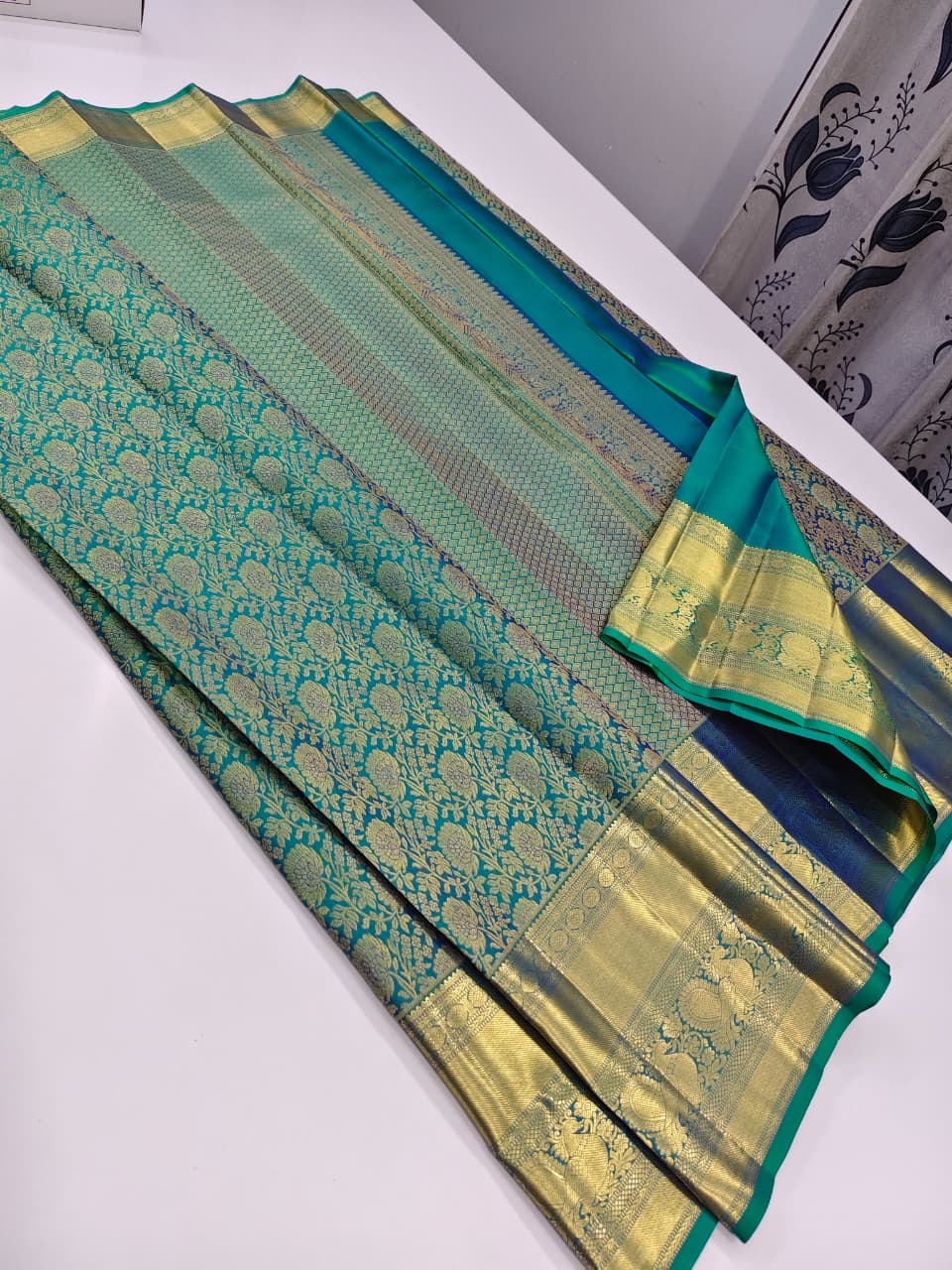 Rani Pink Kanjivaram Silk Saree with a Broad Golden Zari Border